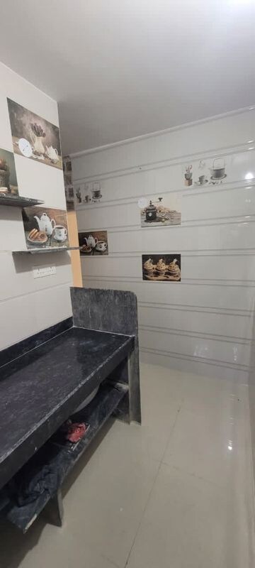 Kitchen in 2 BHK Apartment at Yashodanandan Apartment, Viman Nagar – for Rent