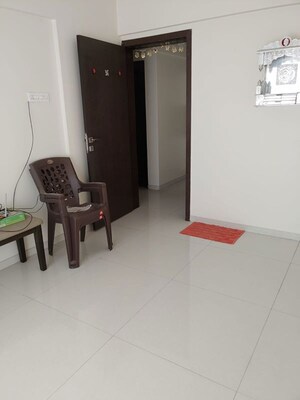 Living Room in 2 BHK Apartment at Welwoath Tinseltown, Bavdhan – for Rent