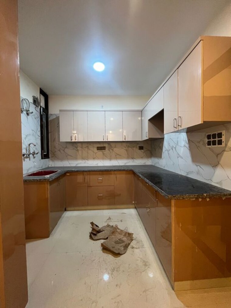 Kitchen, rajpur khurd extension 3 Bedroom 125 Sq.Yd. Builder Floor In Rajpur Khurd Extension Delhi 10059687