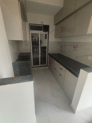 Kitchen in 1 BHK Apartment at Ram Pushpanjali Residency, Owale – for Rent