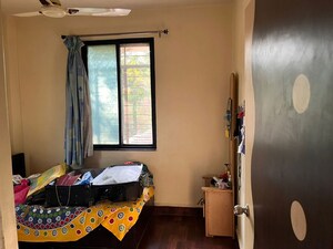 Bedroom in 2 BHK Apartment at Ganga Puram CHS, Viman Nagar – for Rent