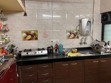 Kitchen in 2 BHK Apartment at Ganga Puram CHS, Viman Nagar – for Rent