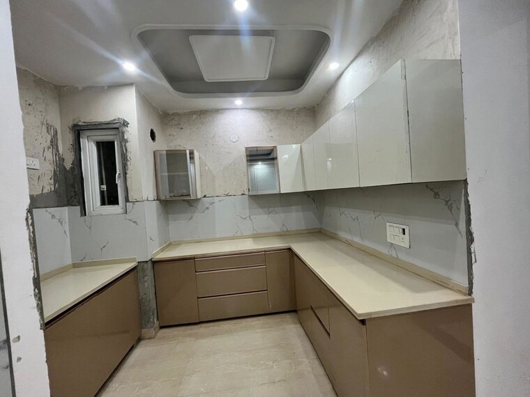 Kitchen, rajpur khurd extension 3 Bedroom 120 Sq.Yd. Builder Floor In Rajpur Khurd Extension Delhi 10059747
