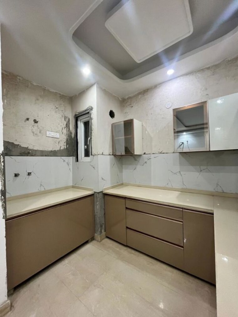 Kitchen, rajpur khurd extension 3 Bedroom 120 Sq.Yd. Builder Floor In Rajpur Khurd Extension Delhi 10059747