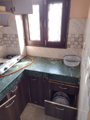 Kitchen in 1 BHK Apartment at Khirki Extension – for Rent