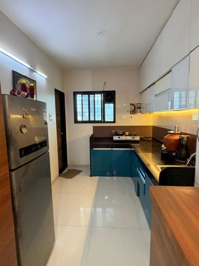 Kitchen, manish-raghunath-zende-sai-harmony 3 Bedroom 1200 Sq.Ft. Apartment In Baner Pune 10059796