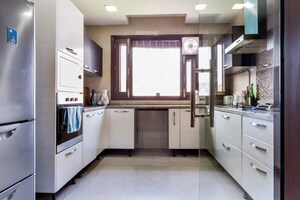 Kitchen in 3 BHK Apartment at Panchsheel Enclave – for Rent