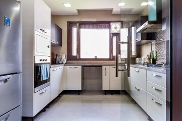 Kitchen in 3 BHK Apartment at Panchsheel Enclave – for Rent