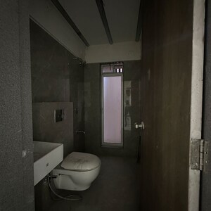 Bathroom in 2 BHK Apartment at Advait Eternal, Nehru Nagar – for Rent