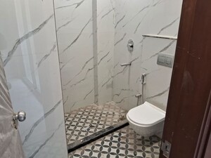 Bathroom in 3 BHK Builder Floor at East Of Kailash – for Sale