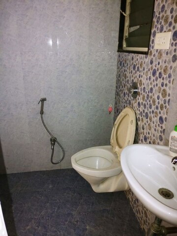 Bathroom in 3 BHK Apartment at Ashray Jagannath Dham, Bavdhan – for Rent