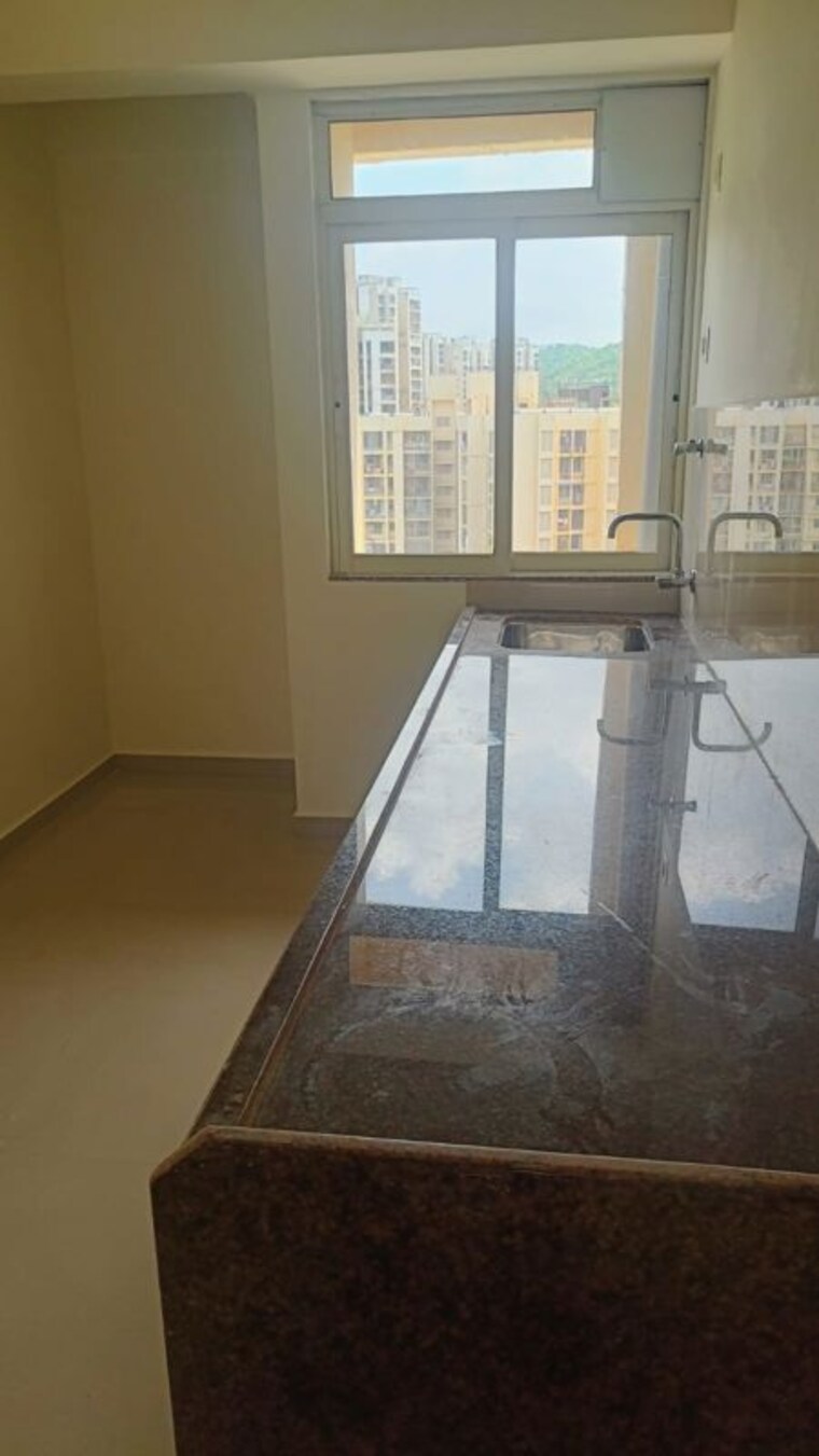 Kitchen, puraniks-tokyo-bay 2 Bedroom 608 Sq.Ft. Apartment In Kasarvadavali Thane 10060091