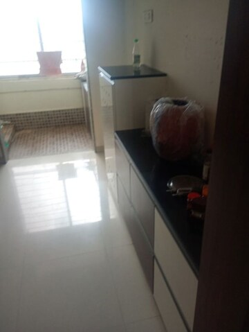 Kitchen in 2 BHK Apartment at Axis Paradigm Whistling Meadows, Paud Road – for Rent