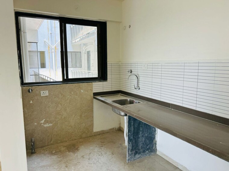 Kitchen, gaikwad-nirvanas 2 Bedroom 800 Sq.Ft. Apartment In Wakad Pune 10060111