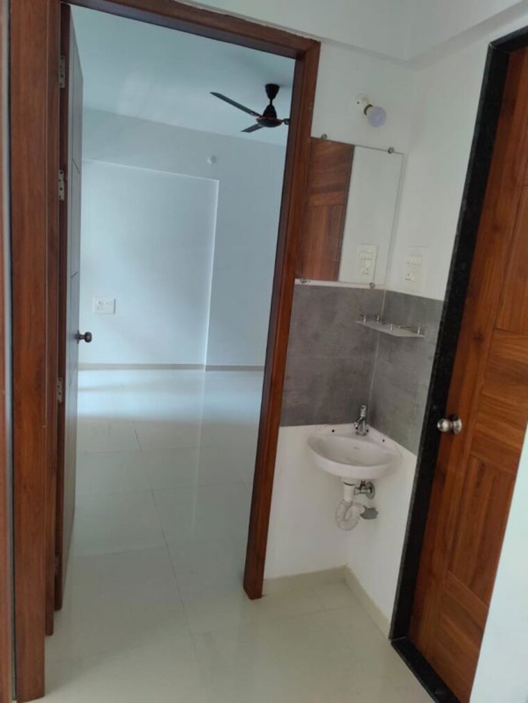 Bathroom, divine-reves 2 Bedroom 725 Sq.Ft. Apartment In Wakad Pune 10060125