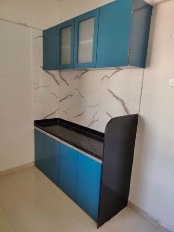 Kitchen in 2 BHK Apartment at Divine Reves, Wakad – for Sale