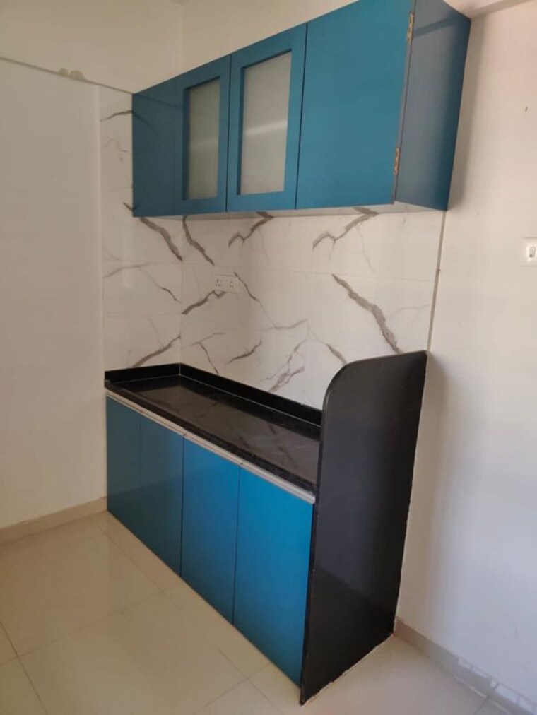 Kitchen, divine-reves 2 Bedroom 725 Sq.Ft. Apartment In Wakad Pune 10060125