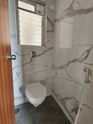 Bathroom in 1 BHK Apartment at Raunak Bliss, Ghodbunder Road – for Sale