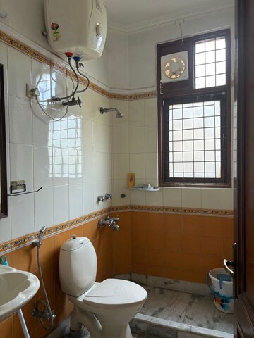 Bathroom in 3 BHK Builder Floor at DLF Atria, Dlf Phase ii – for Rent