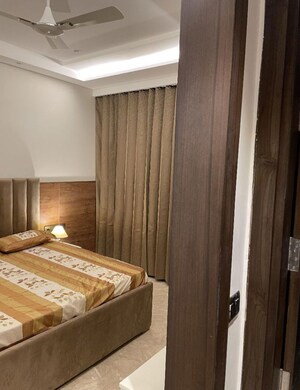 Bedroom in 3 BHK Builder Floor at DLF Atria, Dlf Phase ii – for Rent