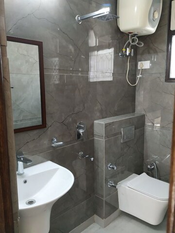 Bathroom in 2 BHK Apartment at Khirki Extension – for Rent