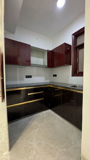 Kitchen in 2 BHK Builder Floor at Palm Residency Chhatarpur, Rajpur Khurd Extension – for Rent