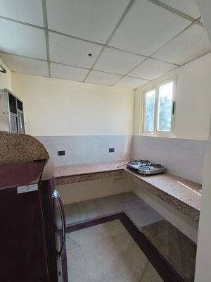 Kitchen in Studio Builder Floor at Greater Kailash I – for Rent