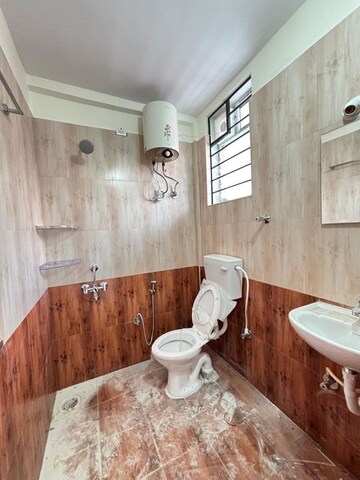 Bathroom in 2 BHK Apartment at Domlur – for Rent
