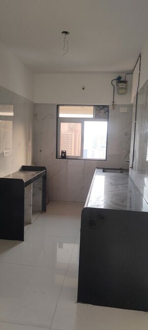 Kitchen in 2 BHK Apartment at Kamla Sukhshanti, Kandivali West – for Sale