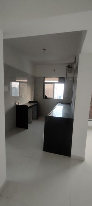 Kitchen in 2 BHK Apartment at Kamla Sukhshanti, Kandivali West – for Sale