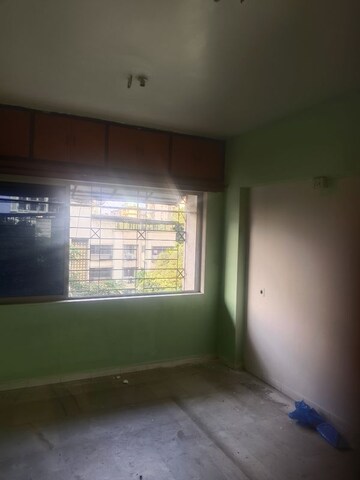 Room in 1 BHK Apartment at Vrindavan Garden Co Hs Society, Kalyan West – for Sale