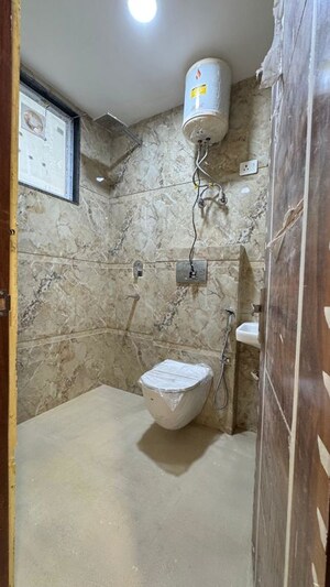 Bathroom in 3 BHK Builder Floor at Palm Residency Chhatarpur, Chattarpur – for Rent