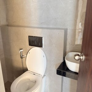 Bathroom in 1 BHK Apartment at Raymond Realty Phase II, Swastik Garden – for Rent