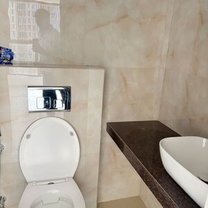 Bathroom in 1 BHK Apartment at Raymond Realty Phase II, Swastik Garden – for Rent