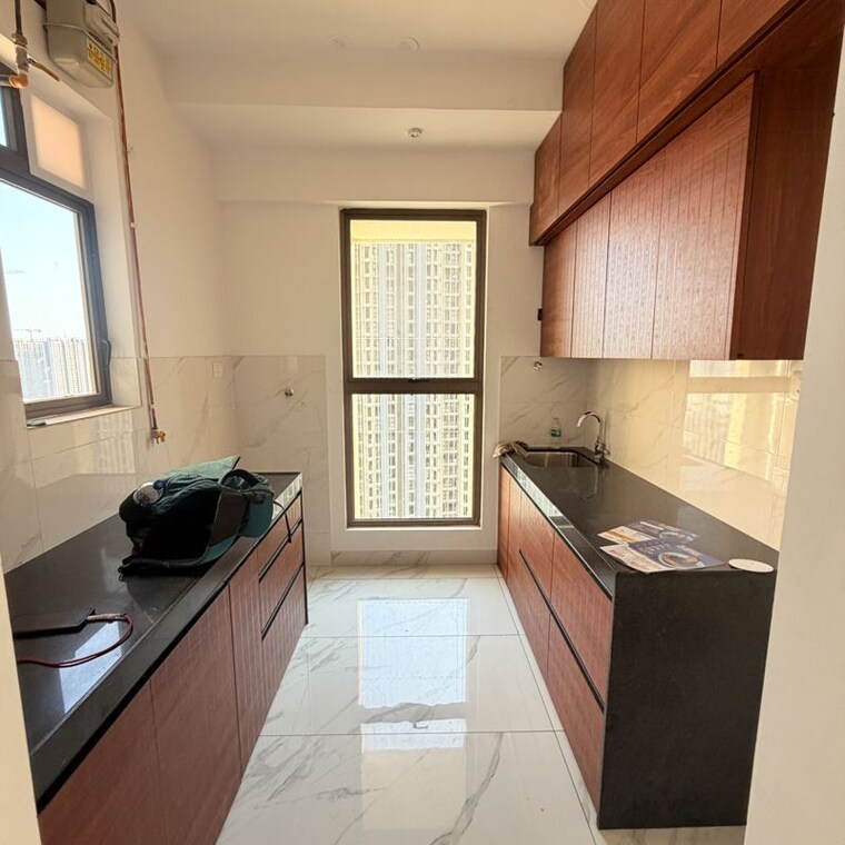 Kitchen, raymond-realty-phase-ii 1 Bedroom 550 Sq.Ft. Apartment In Swastik Garden Thane 10060355
