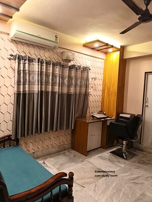 Living Room in 2 BHK Apartment at Chinar Park – for Sale