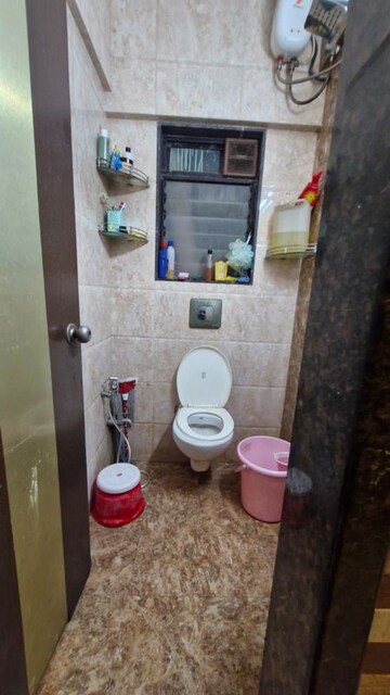 Bathroom in 1 BHK Apartment at Surya Kiran CHS Ghansoli, Ghansoli – for Sale