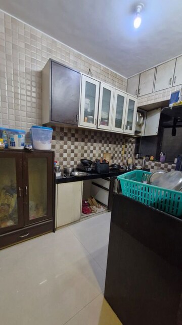 Kitchen in 1 BHK Apartment at Surya Kiran CHS Ghansoli, Ghansoli – for Sale