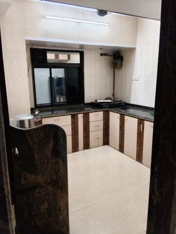 Kitchen in 2 BHK Apartment at Sea Breeze Tower, Nerul – for Rent