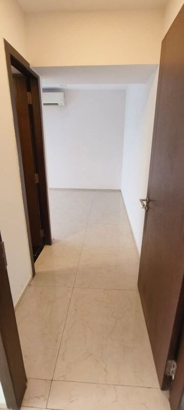 Building Lobby in 2 BHK Apartment at Chandak Cornerstone, Worli – for Rent