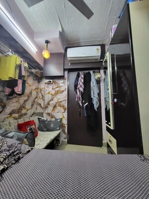 Master Bedroom in 1 RK Apartment at Nasar Apartments, Andheri West – for Sale