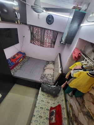 Master Bedroom in 1 RK Apartment at Nasar Apartments, Andheri West – for Sale