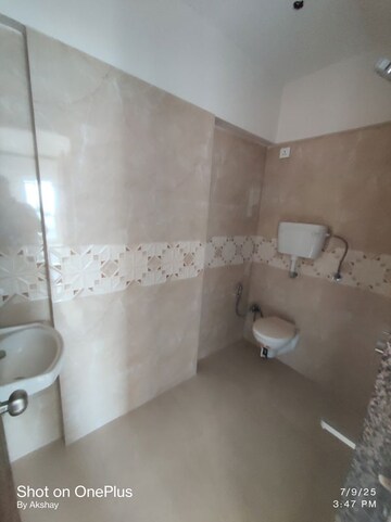 Bathroom in 2 BHK Apartment at Millionaire Heritage, Andheri West – for Sale