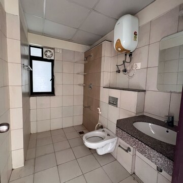 Bathroom in 2.5 BHK Apartment at Godrej Oasis, Sector 88a – for Rent