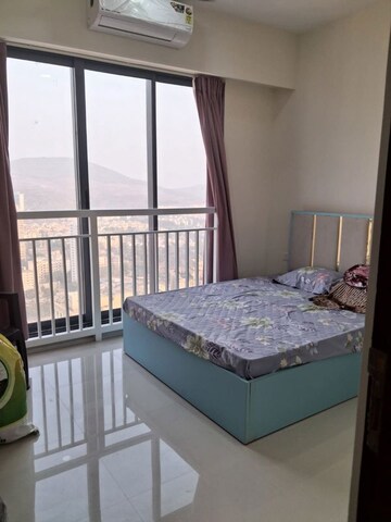 Bedroom in 2 BHK Apartment at Dynamix Divum, Malad East – for Rent