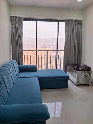 Living Room in 2 BHK Apartment at Dynamix Divum, Malad East – for Rent
