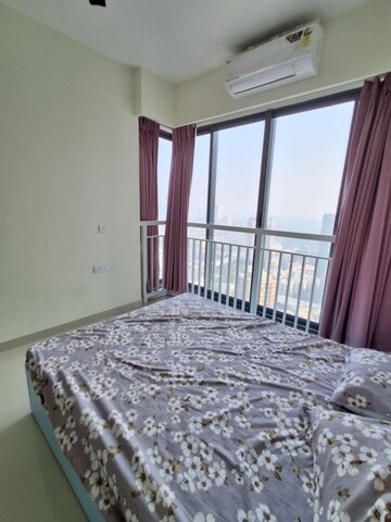 Bedroom in 2 BHK Apartment at Dynamix Divum, Malad East – for Rent