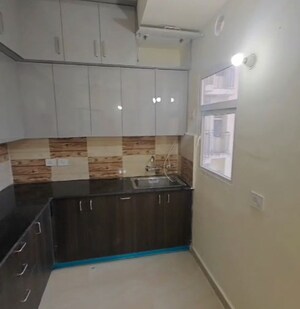 Kitchen in 3 BHK Apartment at Amrapali Dream Valley, Tech Zone 4 Greater Noida – for Rent