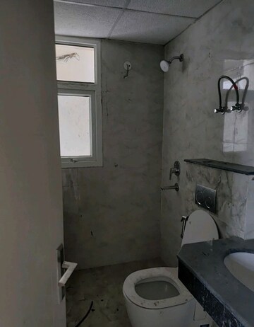 Bathroom in 2 BHK Apartment at Wave Dream Homes, Wave City – for Rent