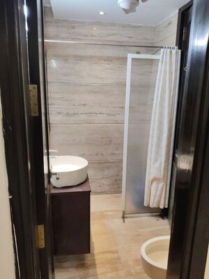 Bathroom in 1 BHK Apartment at Greater Kailash I – for Rent